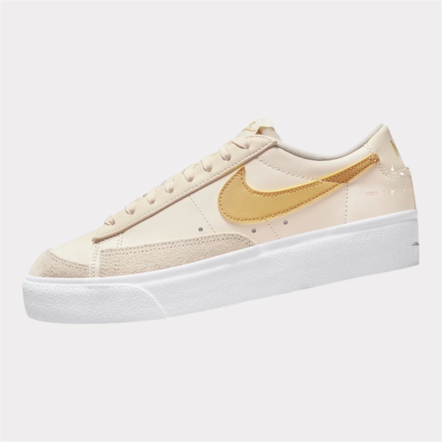 NIKE W BLAZER LOW PLATFORM SATURN OR BLANC NIKE
